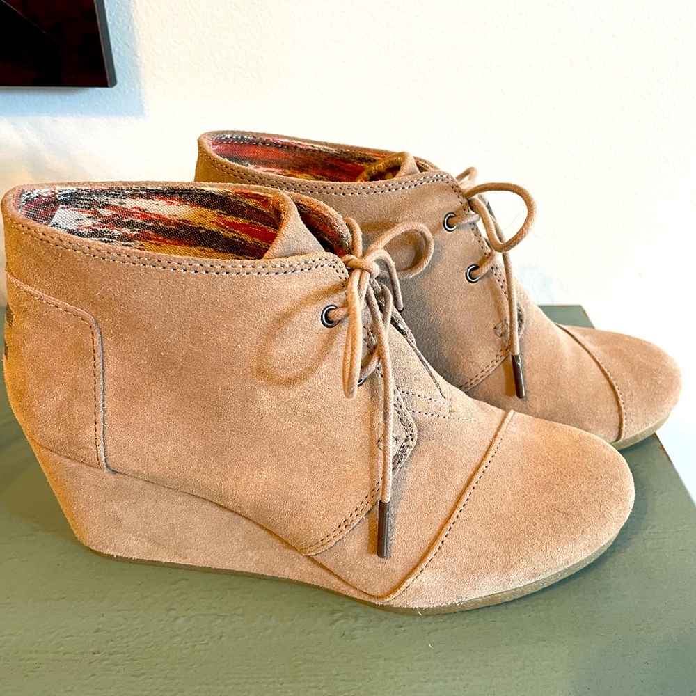 Tom’s tan booties